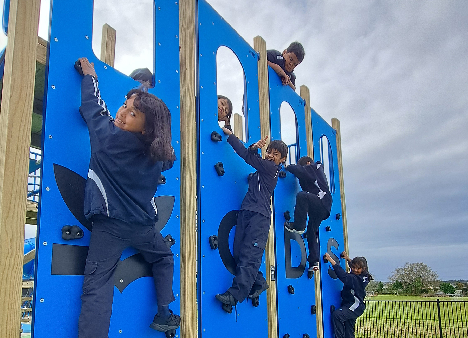 Kids on Climbing wall after school care programmes