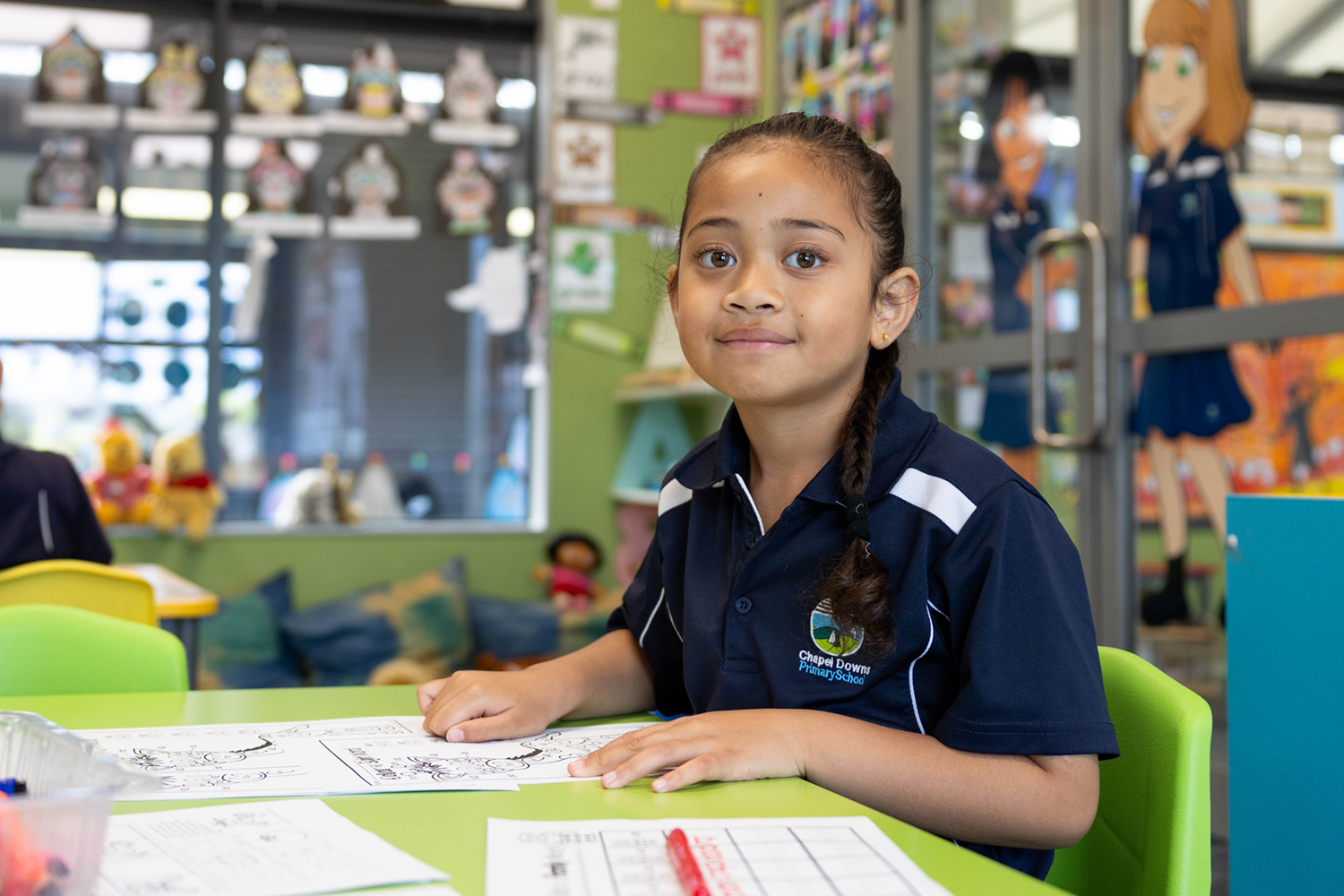 Girl learning in Primary school our board of trustees